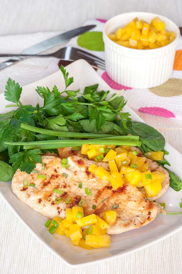 Delicious grilled chicken served with a home-made mango salsa